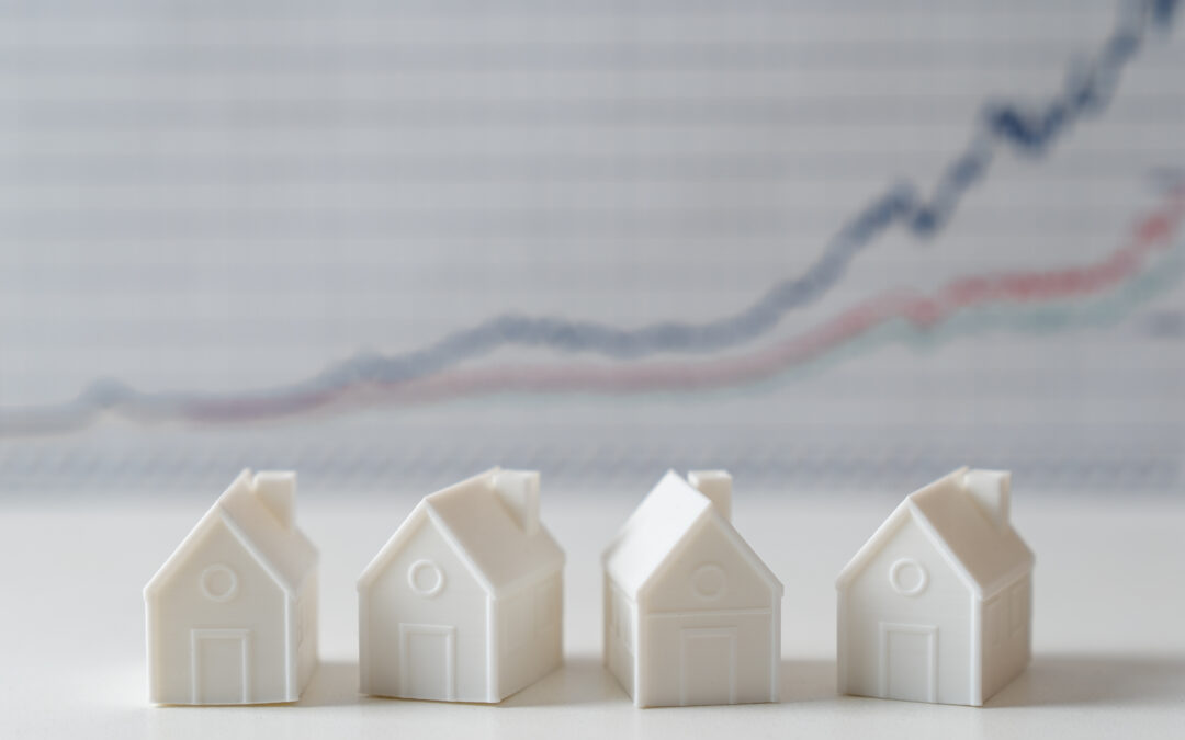 image of decoy houses in front of housing market graph